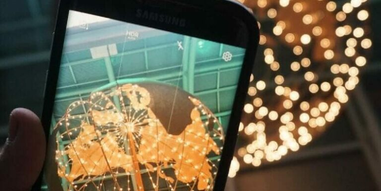 globe lights and a phone